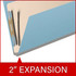 Close-up of blue classification folder showing the 2-inch gray Tyvek expansion