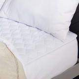 Sleep Perfect Quilted Electric Blanket by Sunbeam on bed