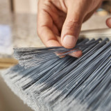 Cleantech Wall-Mounted Broom by Joseph Joseph