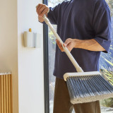 Cleantech Wall-Mounted Broom by Joseph Joseph
