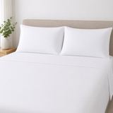 Crisp Commercial Standard Pillowcases in Bed Setting (sold separately)