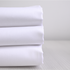 Stack of Plain White Tea Towels by Good Linen Co