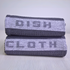 Stack of Commercial Charcoal Cotton Waffle Dish Cloths showing the words "Dish" and "Cloth" down the centre of each dish cloth