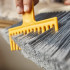 Cleantech Wall-Mounted Broom by Joseph Joseph