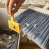 Cleantech Wall-Mounted Broom by Joseph Joseph
