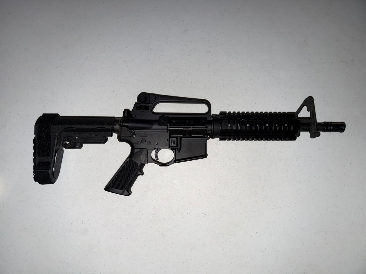 Spikes Tactical ST-15 556/223 10.5" Threaded Barrel Bayonet Lug Attachment Picatinny Quad Rail Forend SBA3 Pistol Brace Black Color with 30rd Magazine (New)