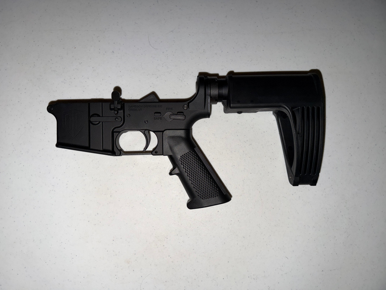Davidson Defense DD-15 556/223 with SBA4 Pistol Brace and 4lb Trigger Lower Black Color (New)