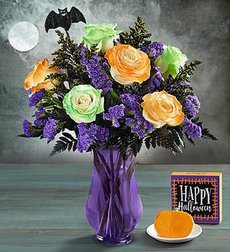 Wicked Bouquet
EXCLUSIVE Our wicked beauty puts the “boo!” in bouquet. Six long-stem roses are air brushed on our floral farms with their own unique mix of orange or green so that no two are exactly alike. Topped with a glittery bat pick, this is one Halloween gift they’ll be dying to show off.