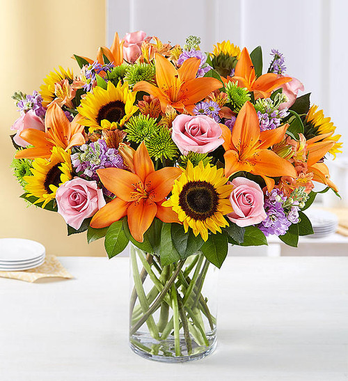 Designed to be as unforgettable as the person who receives it, our luxurious arrangement of colorful, fresh-from-the-garden blooms, artistically designed inside a chic cylinder vase by our expert florists, creates the ultimate wow gift for someone who means the world to you. Designed to be as unforgettable as the person who receives it, our luxurious arrangement of colorful, fresh-from-the-garden blooms, artistically designed inside a chic cylinder vase by our expert florists, creates the ultimate wow gift for someone who means the world to you.
