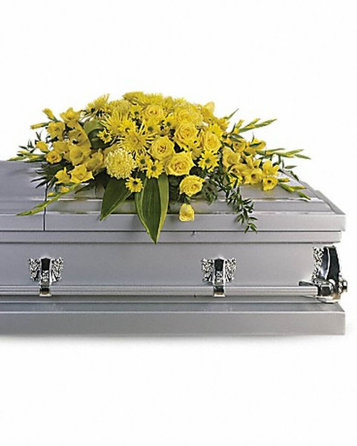A bevy of yellow blossoms such as roses, gladioli, chrysanthemums and more are perfectly arranged in this lovely casket spray.
