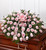 Pink Rose Half Casket Cover
The ultimate symbol of grace, love and admiration, soft pink roses are a sentimental way to honor someone who was deeply cherished. Our half casket cover, crafted with care and artistry by our expert florists with over 50 of these  soft-hued blooms and accented with a pink satin ribbon, is an unforgettable way to commemorate a lifetime of unconditional love.