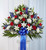 The love they showed for their country is as deep as the love felt by those mourning their loss. Meticulously crafted by our expert florists to honor a proud veteran who has passed away, our majestic standing basket arrangement is filled with lush blooms in patriotic red, white and blue, creating a fitting final tribute for the funeral services.