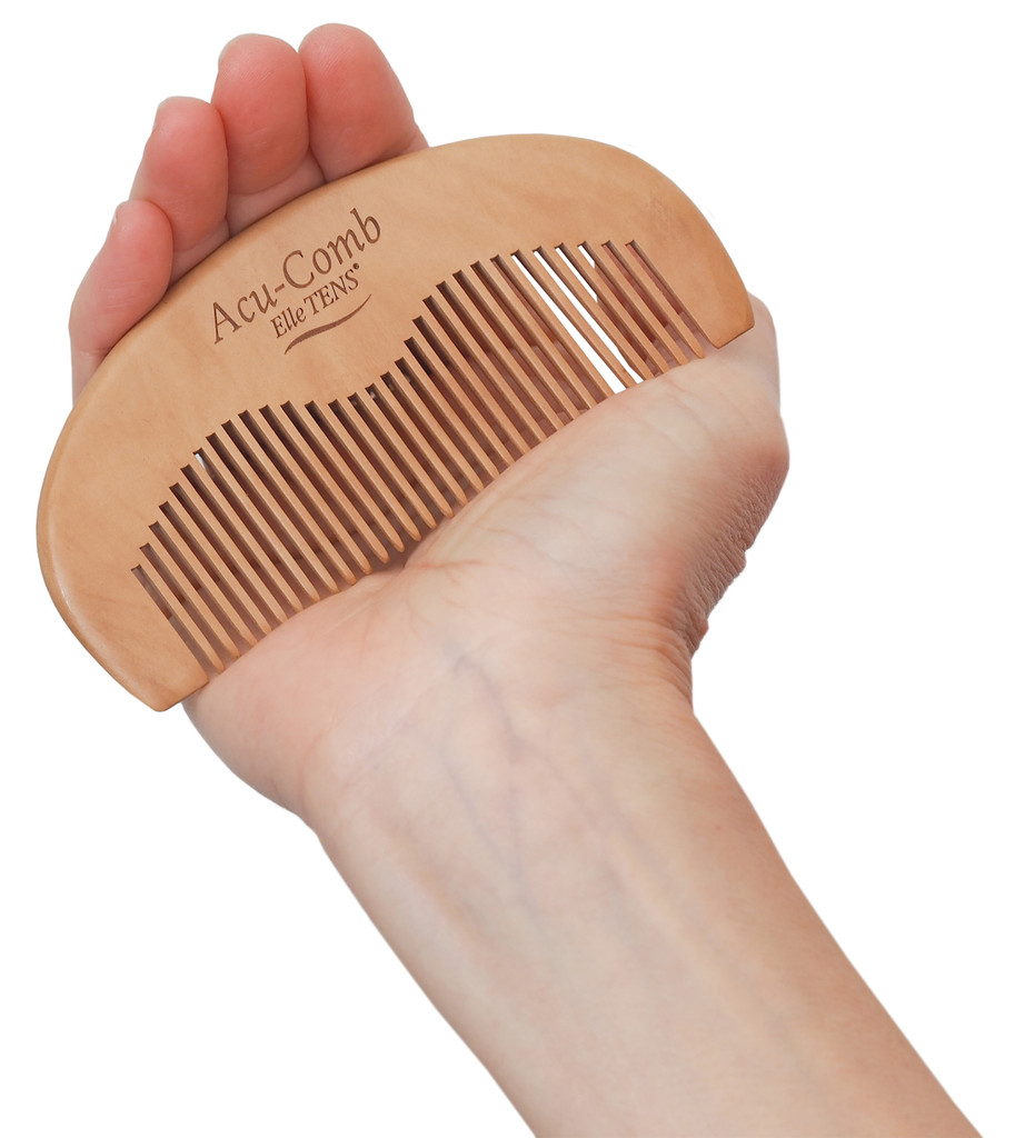 acu-comb in hand