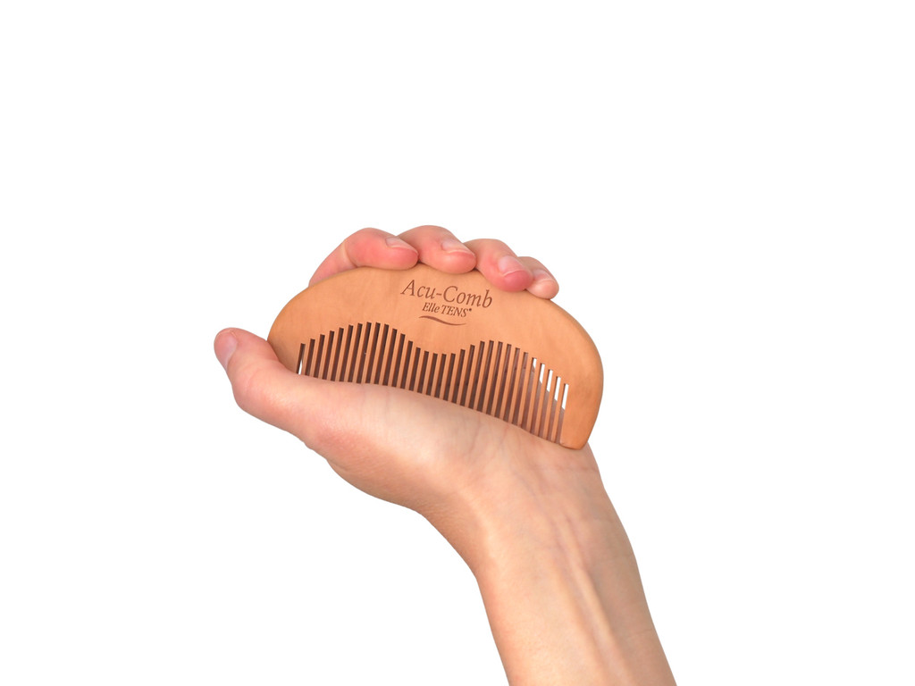 Acu-comb in hand