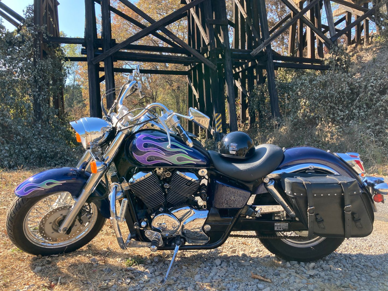 Motorcycle with green and purple flames