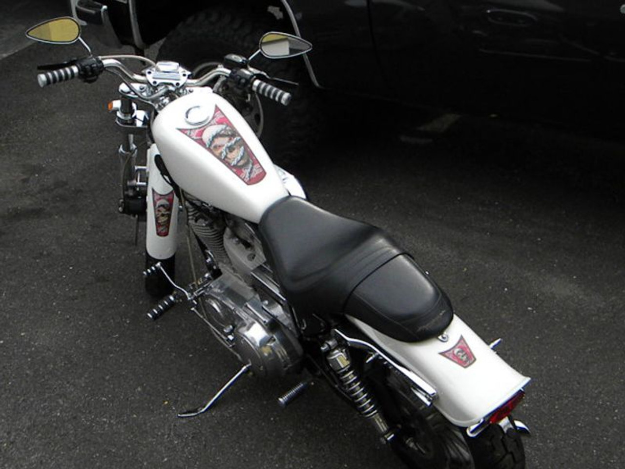 Shown in Cherry Red
on a 3.3 gal  97 sportster tank