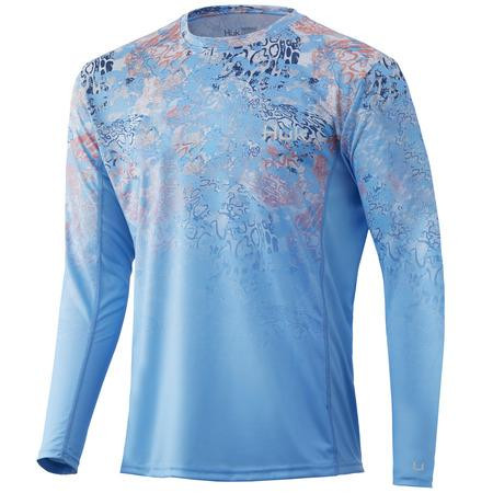 HUK Icon X TC Fade LS, light blue long-sleeve performance fishing shirt with a colorful abstract fade pattern across the shoulders and chest.