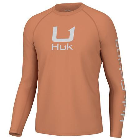 HUK ICON LS CREW, long sleeve athletic performance shirt in tan color with white logo and branding