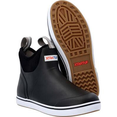 XTRATUF 22736 Ankle Deck Boot, black waterproof slip-on shoe with white sole and red logo, designed for durability and safety in marine and outdoor activities.