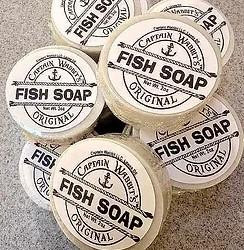 Captain Wabbit Fish Soap, round soap bars with black and white logo design featuring text and fish illustration.