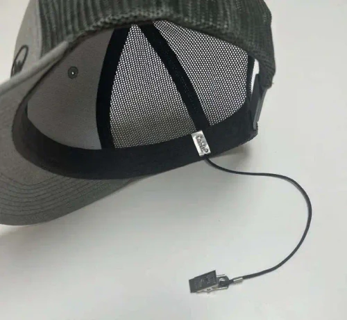 CABLZ INC. Cablz Hat ClipZ, a hat clip with a USB cable attached, designed to secure sunglasses or small items to a hat or cap.