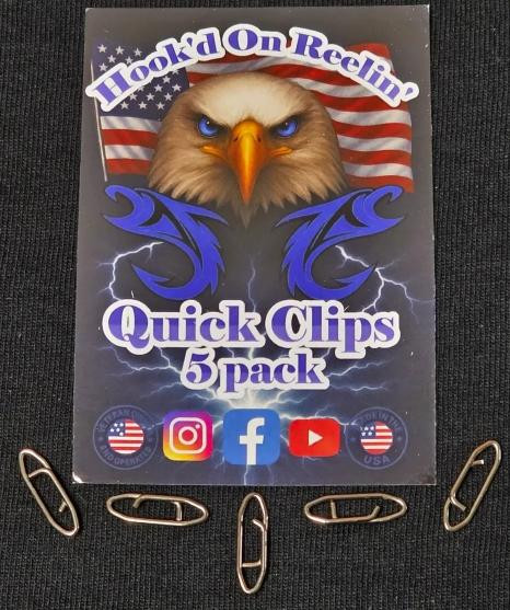Hook'd On Reelin' Quick Clips, five metal fishing clips displayed on top of a product packaging with an eagle and American flag background.