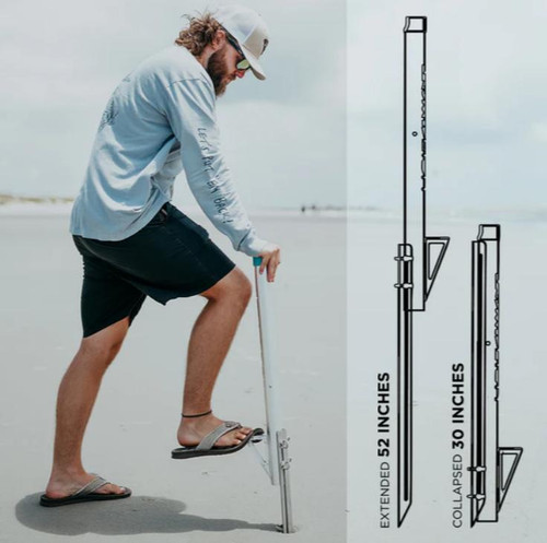 Toadfish Stowaway Surf Spike, a portable surf fishing stakeout device shown being used by a man on the beach, with detailed size comparison outline included.