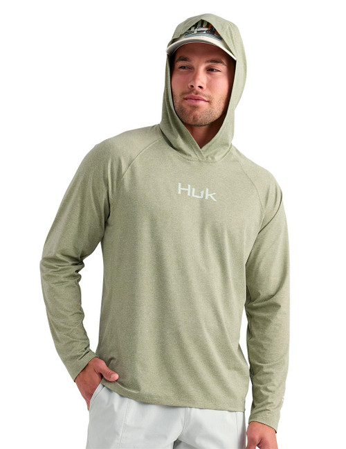 HUK Huk Airweight LS Hoodie, light green long sleeve hoodie with hood and white HUK logo on chest, made of lightweight, breathable fabric.