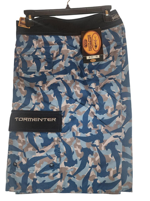 TORMENTER Tormenter Hammerhead Boardshort, men's boardshorts featuring a blue shark camouflage pattern with a black waistband and a pocket on the side.