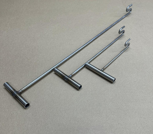DEERFIELD FABRICATION Deerfield Fabrication De-Hooker S-Bend, set of metal rods with hooked ends and cylindrical connectors on a beige background.