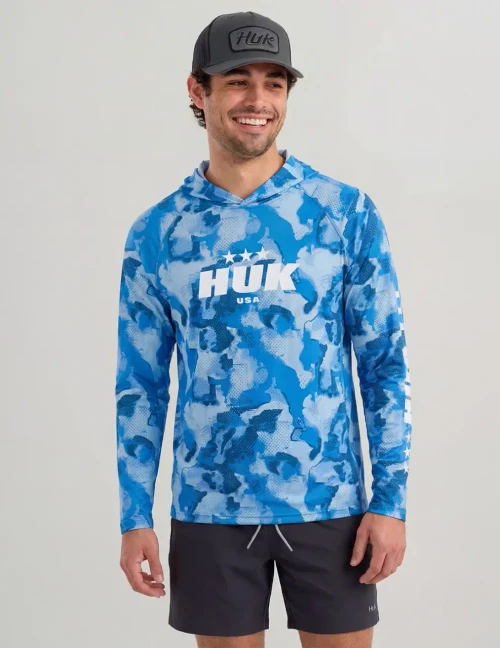 HUK Huk Airweight USA KC Printed Hoodie, blue camouflage patterned hoodie with white 'HUK USA' logo and three stars on the front.