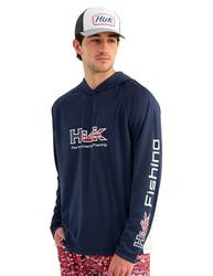 HUK Huk Pursuit Americana Fill Hoodie, a man wearing a navy blue hoodie with HUK logo and Americana design, standing against a plain background.