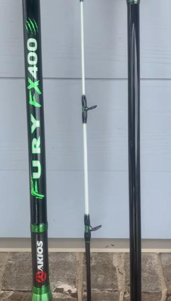 AKIOS Akios Fury FX400 Rod, fishing rod with black and green design and markings, displayed vertically against a light background.