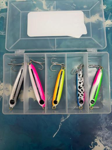 PLANO MOLDING COMPANY Plano Stowaway 3400 - 5 Compartments, clear plastic tackle storage box with five compartments containing fishing lures in various colors and designs.