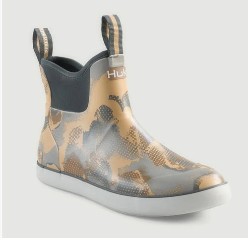 HUK Huk Rogue Wave Boots, waterproof rain boots with a khaki and black camouflage pattern, slip-on style with pull tabs for easy wearing.