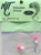 NINJA TACKLE Ninja Tackle LIL SCOTTY #2, fishing hook with pink and white bobber attached, packaged in a transparent plastic bag with green background label.