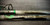 NINJA TACKLE Ninja Tackle 12' K Series Dagger 3-8oz Rod, close-up of the fishing rod with branding visible on a gray surface.