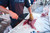 SORD Fishing Products Knives, angler fillets fresh fish with a SORD knife on a boat cutting table