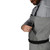 FROGG TOGGS Frogg Toggs Hellbender Pro Boot Foot Chest Wader, close-up of a man adjusting the waterproof chest pocket of the grey wader while wearing a grey shirt and black belt.