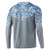 HUK Icon X TC Fade LS, back view of a long-sleeve fishing shirt with a blue and white camouflage shoulder yoke and gray body