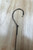 F&F Shark Rigs, a fishing hook with a sturdy metal wire and a sharp hook for shark fishing.