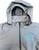 F&F Waterproof Jacket, light gray waterproof jacket with a hood and front zipper, featuring a logo of Frank & Frans Bait & Tackle on the chest.
