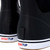 XTRATUF 22736 Ankle Deck Boot, black rubber ankle deck boots with white soles and red and blue branding, waterproof and durable for industrial and outdoor use.