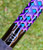 NICK'S CUSTOM RODS 2025 Nick's Custom Rods - CTS 1305, a fishing rod with a vibrant purple, blue, and black geometric pattern.