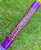 Nick's Custom Rods 2025 Nick's Custom Rods - CTS 1305, vibrant purple fishing rod with a detailed geometric pattern in bright colors, on green grass background.