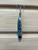 ES Lures 125OG, fishing lure with a blue and black patterned design and double treble hooks, 2.5 inches long, 1.25 ounces weight.