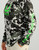 HUK Icon KC Printed LS Crew, men's long sleeve athletic shirt with black and white abstract camouflage pattern and neon green logo and text.