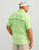 HUK Diamond Back Current Plaid SS, a men's light green plaid short-sleeve shirt worn by a man with a cap.