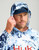 HUK Pursuit Mossy Oak Printed Hoodie, man wearing a camouflage hoodie with a built-in hood and a matching printed cap underneath.