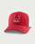 HUK Filled Barb U Trucker, red and white mesh trucker cap with embroidered logo on front.